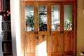 doors from antique fir used as a room divider