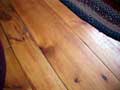 wide plank floor showing square cut nails