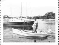 At 16, in his hand-made boat