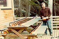 60 wooden chain saws, all designed and built by Gary