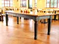 Roses Cafe table in Eastsound made from floor joists of an old vinegar plant